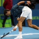 Thua sốc ở bán kết Qatar Open, Djokovic lỡ cơ hội cân bằng kỷ lục của Federer